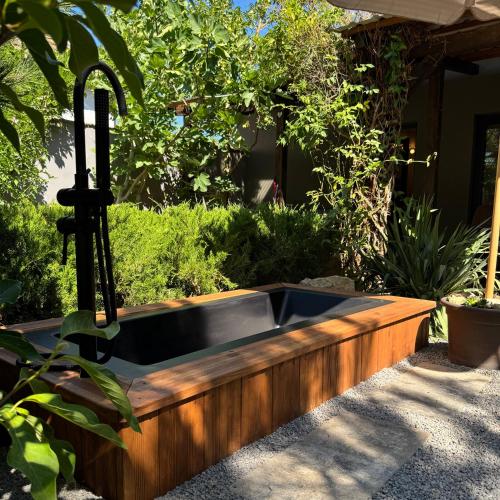 a sink in a garden in a yard at Garden 52 in Šutovce