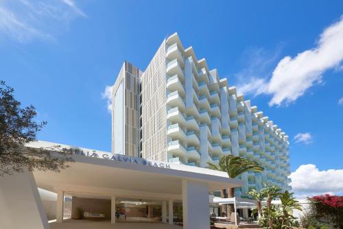a view of the mgm hotel from the street at Meliá Calviá Beach in Magaluf
