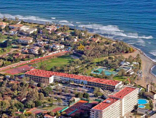 an aerial view of a resort next to the ocean at SOL by Meliá Marbella Estepona - Atalaya Park in Estepona