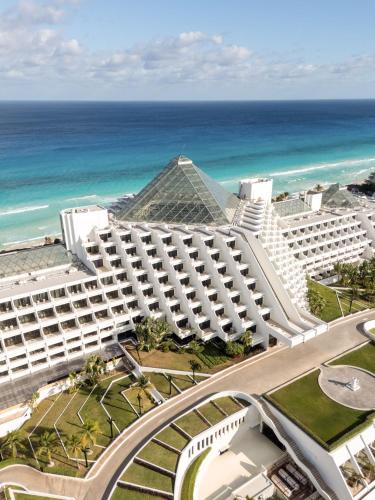 an aerial view of a hotel and the ocean at Paradisus by Meliá Cancún -All Inclusive in Cancún