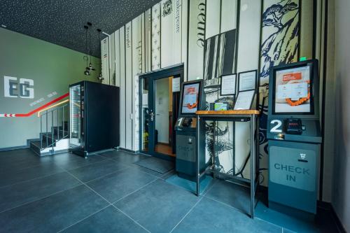 a room with two atm machines in a building at Brera Serviced Apartments Ulm in Ulm