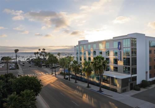 a rendering of a building with a street and palm trees at Hilton Garden Inn San Diego Downtown/Bayside, CA in San Diego