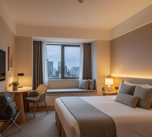 a hotel room with a large bed and a window at Hotel kalyan near by Delhi igi airport free Pickup in Etāwah