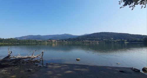 a view of a lake with mountains in the background at cascina lago in Montorfano