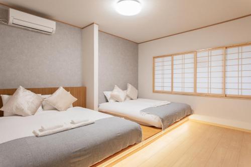 New! Direct access to Namba & KIX 金洲House懿-花园北 通天閣徒歩圏 3階建て一棟貸切 最大14名