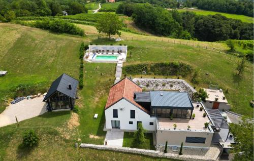 an aerial view of a house with a pool at Beautiful Home In Banfi in Štrigova