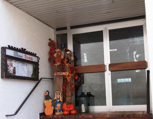 a front door of a house with halloween decorations at Hotel Lamm in Waiblingen