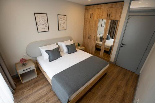 a bedroom with a large bed in a room at Letstay Marine Homes in Antalya