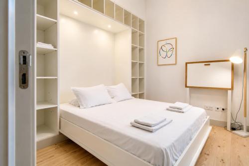 Charming Baixa 3BR with Balcony by LovelyStay