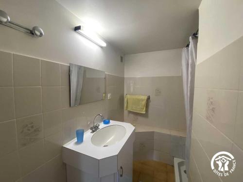 a bathroom with a sink and a mirror at Ribelles in Eus