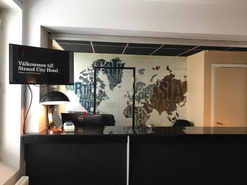 Vstupní hala nebo recepce v ubytování Strand City Hotel