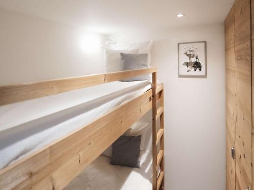 Appartement cosy 4 pers, 2 ch, départ ski aux pieds, exposé sud, proche commerces