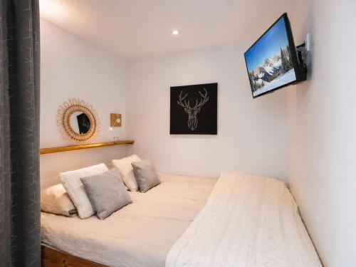 Appartement cosy 4 pers, 2 ch, départ ski aux pieds, exposé sud, proche commerces