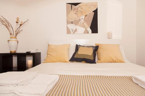 Un pat sau paturi într-o cameră la In villa