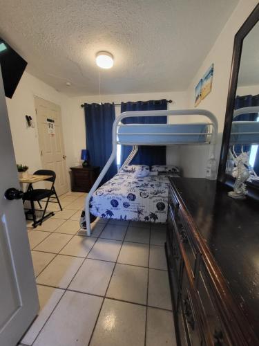 a bedroom with a bunk bed in a room at Coco Sol 2 by MyMiamiStay in Miami