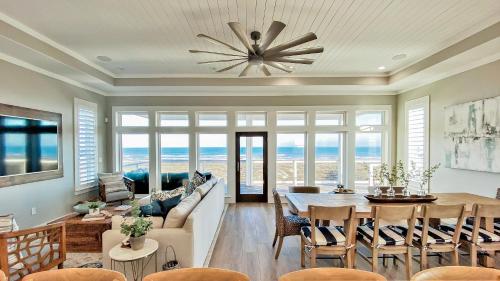 a living room with a couch and a table at The Sanctuary in Padre Island