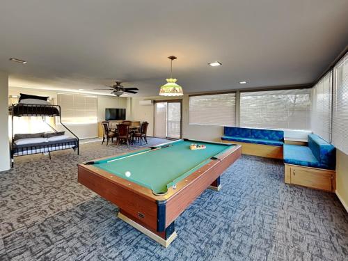 a living room with a pool table in it at The Crows Nest in Ruidoso