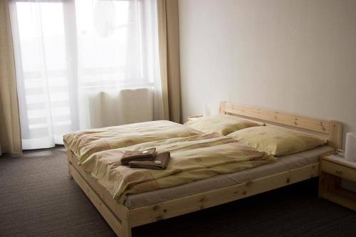 Postel nebo postele na pokoji v ubytování Penzion Luka
