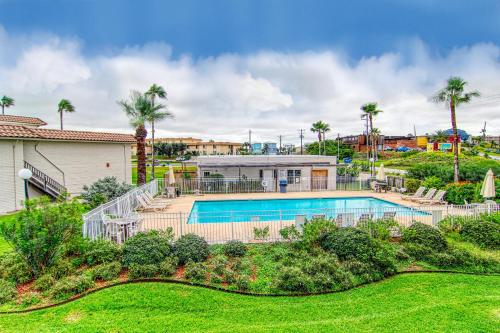 an aerial view of a house with a swimming pool at Pearl Marlin in Port Aransas