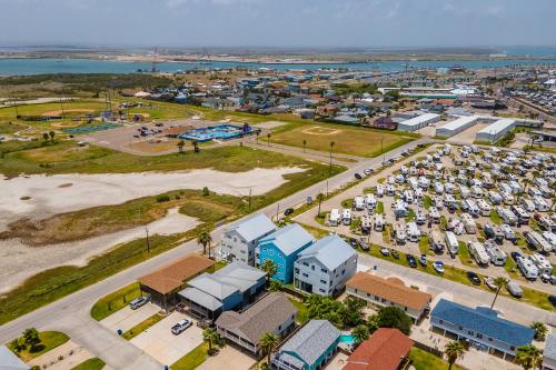 an aerial view of a parking lot with cars at Ocean Spirit in Port Aransas