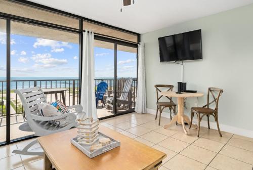 a living room with a view of the ocean at Laguna Reef #308 - Beautiful Bay View in Rockport