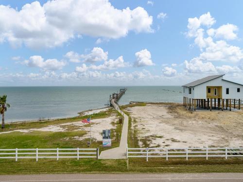 a house on the beach next to the ocean at LR 309 - Ms, Annies Oasis in Rockport