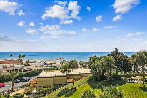 an aerial view of a resort with the ocean in the background at San Luis Resort 533 - Luis Laid Back in Galveston