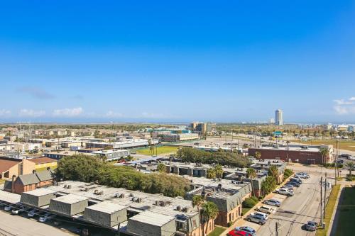 an aerial view of a city with cars parked at Emerald 705 in Galveston