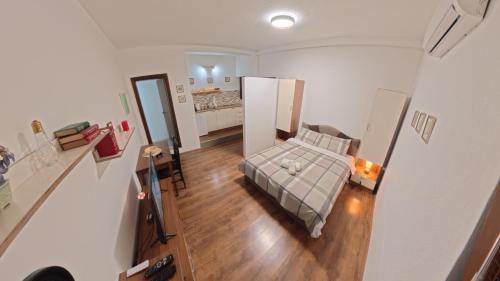 an overhead view of a living room with a couch at STUDIO 88 red in Ohrid