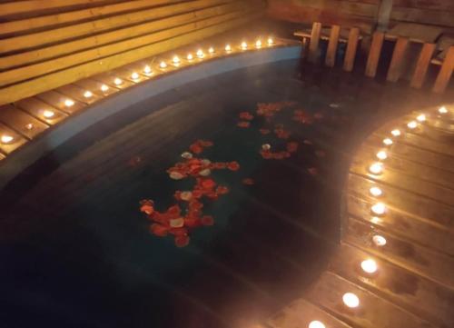 an overhead view of a pool of water with lights at Hospedaje Naomi in Valparaíso
