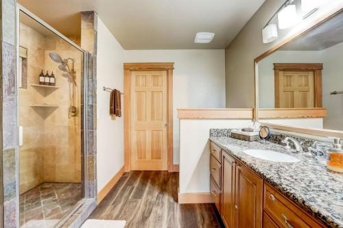 a bathroom with a shower and a sink at On Tahoe Time - Pets Pool Table Game Room in South Lake Tahoe