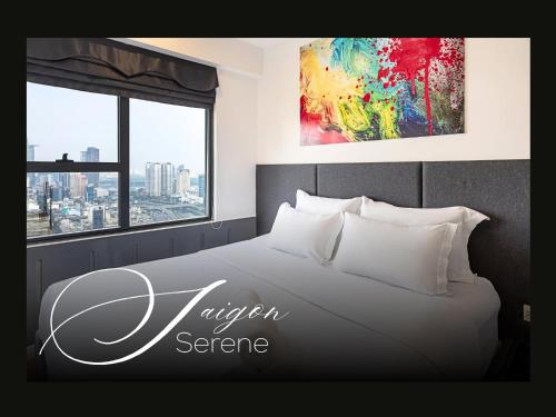 a bedroom with a bed with a painting on the wall at Saigon Serene - SOHO Residence - Stay in District 1 in Ho Chi Minh City