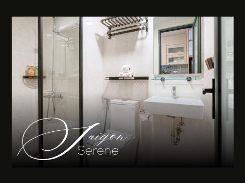 a bathroom with a sink and a shower at Saigon Serene - SOHO Residence - Stay in District 1 in Ho Chi Minh City