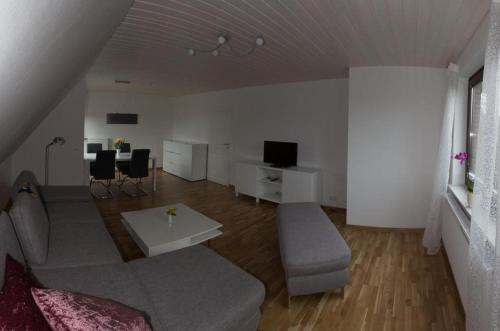 Μια τηλεόραση ή/και κέντρο ψυχαγωγίας στο Appartement bei Kiel