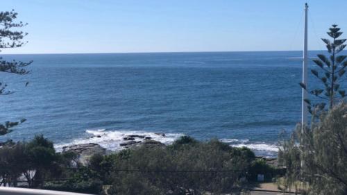 a view of the ocean from a bluff at Sea Eagles Unit 9 in Caloundra
