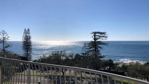 a view of the ocean from a balcony at Sea Eagles Unit 9 in Caloundra