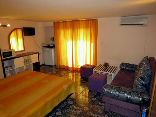 A seating area at Family Hotel Lebed