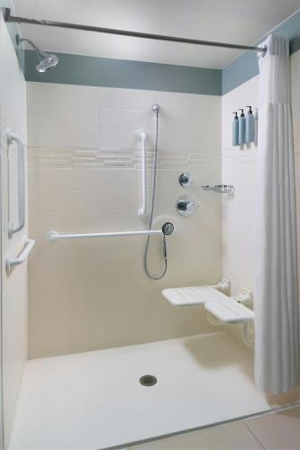 a bathroom with a shower and a toilet at Residence Inn by Marriott Augusta in Augusta