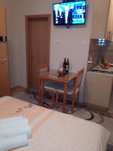 Postel nebo postele na pokoji v ubytování Sun City Apartments