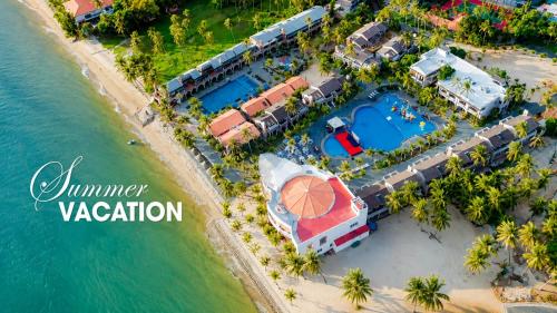 an aerial view of a resort next to the water at Le' VIVA Resort Mui Ne in Mui Ne