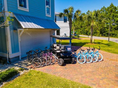 a group of bikes parked next to a garage at Easy Breezy in Santa Rosa Beach
