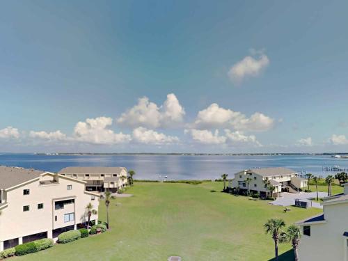an aerial view of a house and the water at Santa Rosa Dunes #952 in Pensacola Beach