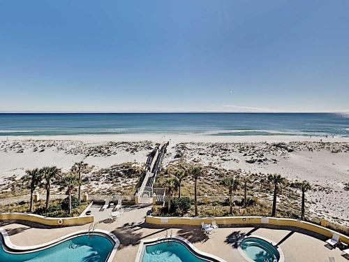 an aerial view of a beach with two pools at Emerald Isle #405 in Pensacola Beach