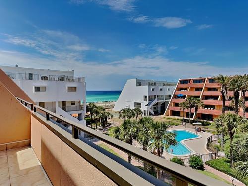 a view of the beach from the balcony of a resort at Aegean 327 in Destin