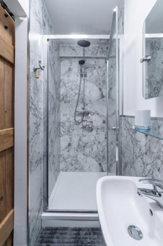 a bathroom with a shower and a sink at 1 Bed in Ambleside oc-lr036 in Ambleside