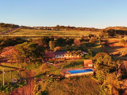an aerial view of a house in a field at Fazenda Itaygua Hotel in Ribeirão Preto