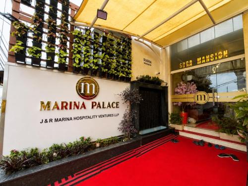 a red carpet in front of a store at The Marina Palace Calicut Premium Beach Hotel in Kozhikode