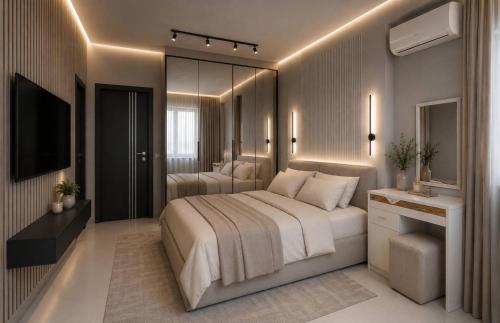 a large bedroom with two beds and a television at Апартаменти Мост Сіті in Dnipro