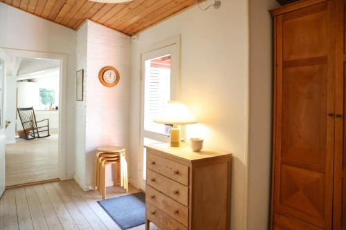 a room with a dresser with a lamp on it at 10033-1-Rorvig-Hjortevej-17 in Rørvig