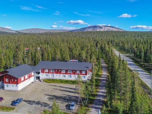 an aerial view of a building with trees at Holiday Home Yllästar 3 as 508 by Interhome in Äkäslompolo